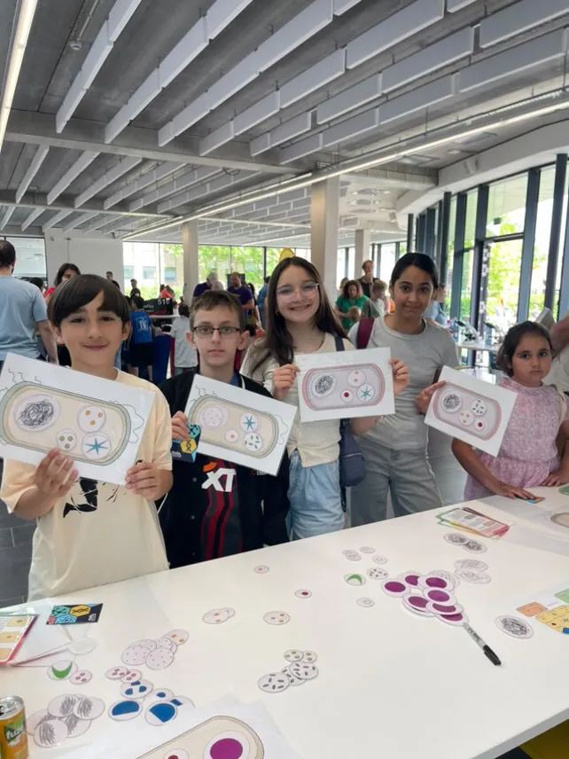 Kids with drawings of cells